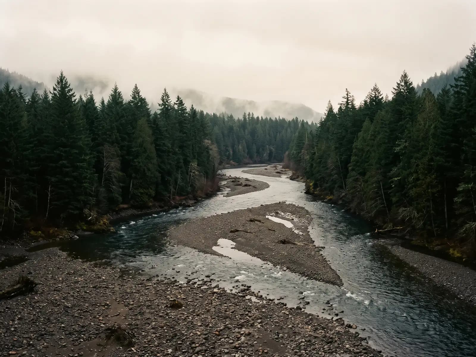 A misty Cascade river whose side channels split from the main channel and rejoin it, with an illustrated card showing a feature branch merging into main.